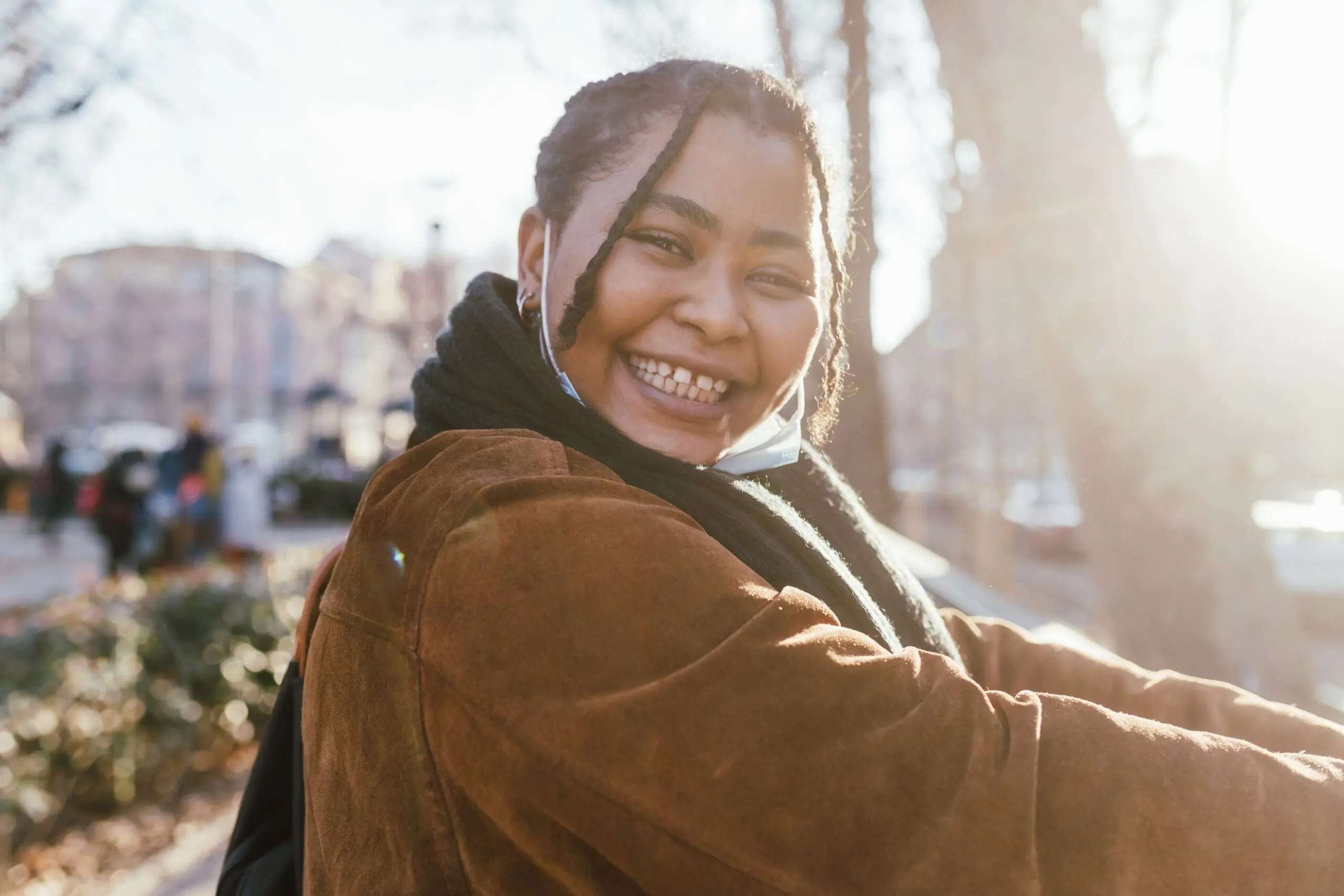 Portrait of smiling young woman outdoors