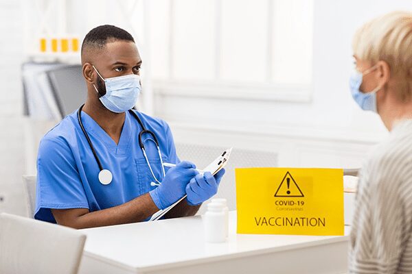 doctor talking to patient